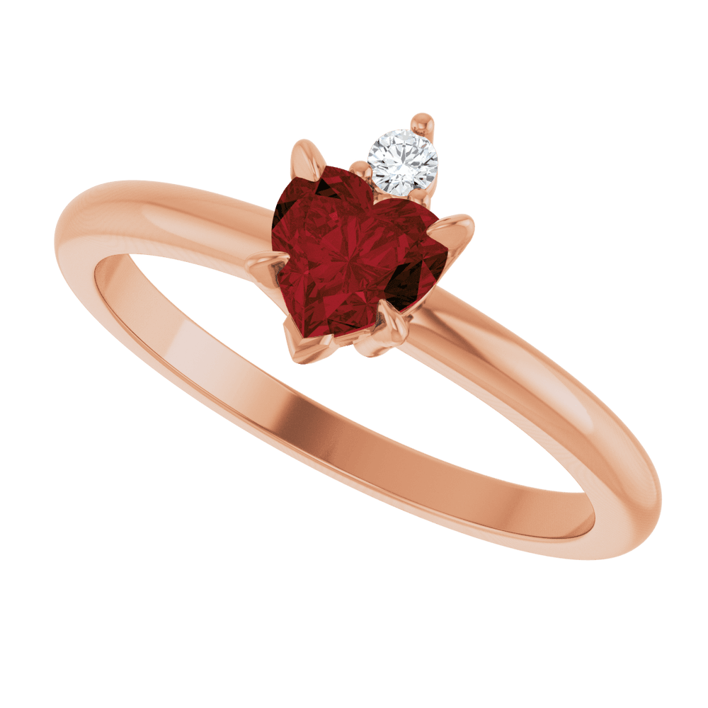 14k rose gold ring with heart-shaped red Mozambique Garnet and round gemstone