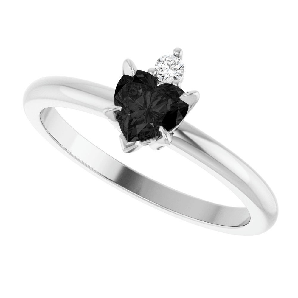 14k white gold ring with heart-shaped black onyx and round gemstone