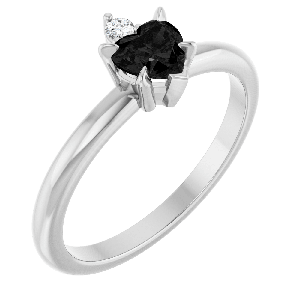 14k white gold ring with heart-shaped black onyx and round gemstone