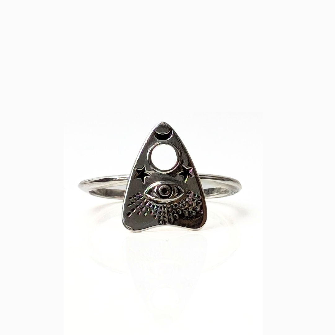 Oracle Ring in sterling silver with mystical eye, moon, and star symbols.