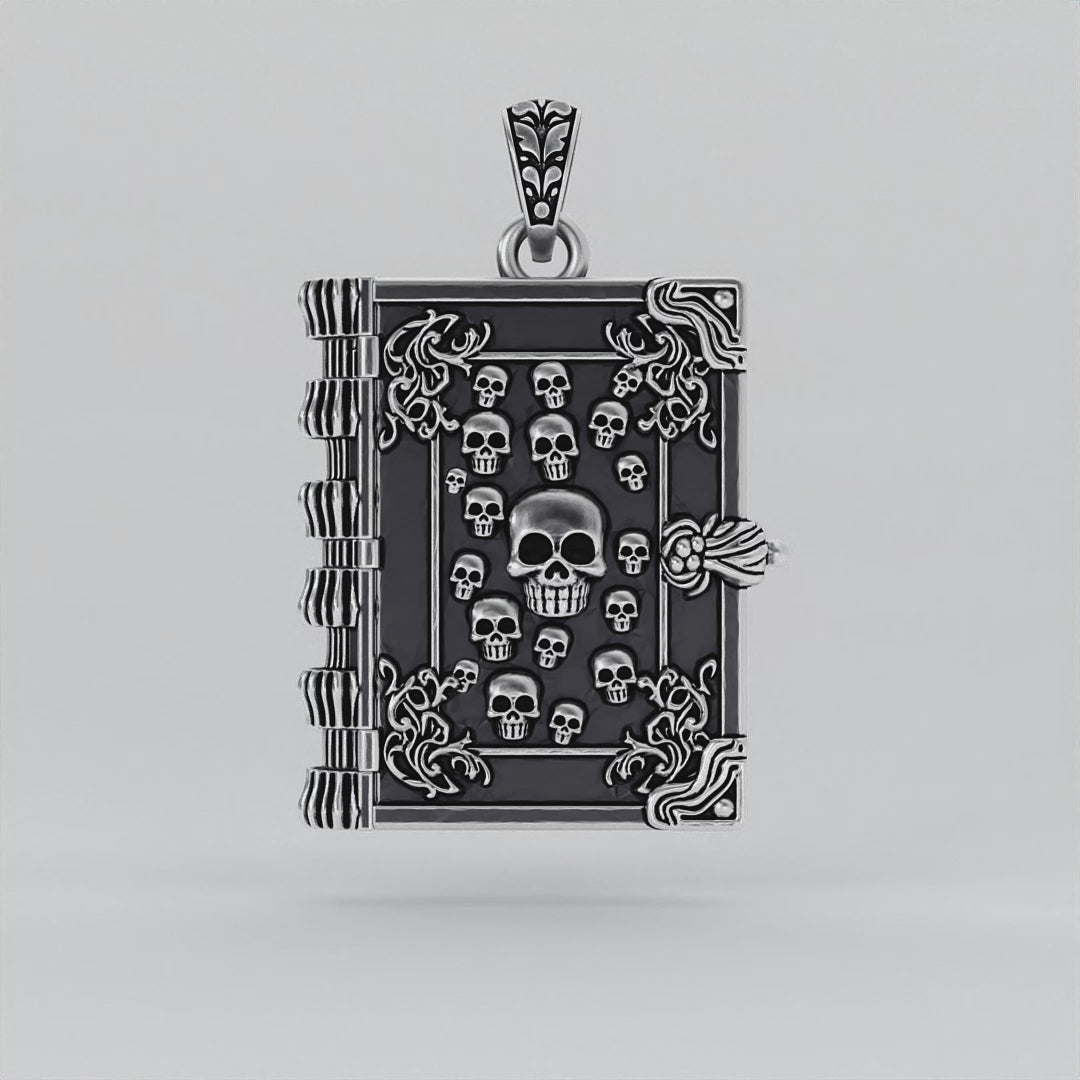 Arcane Book Locket Pendant crafted from blackened sterling silver with skull and filigree details